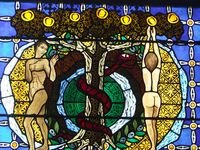 Adam et Eve. Vitrail de la cathédrale de Clermont-Ferrand